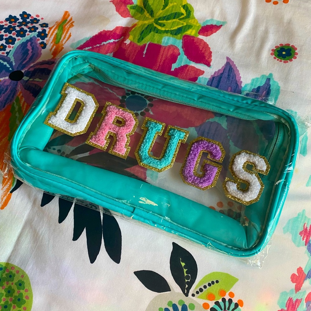 Clear varsity lettered pouch for "drugs"